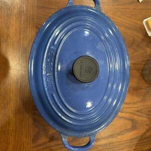 Le Creuset Enameled Cast Iron Signature Oval Dutch Oven, 5 qt, Cerise